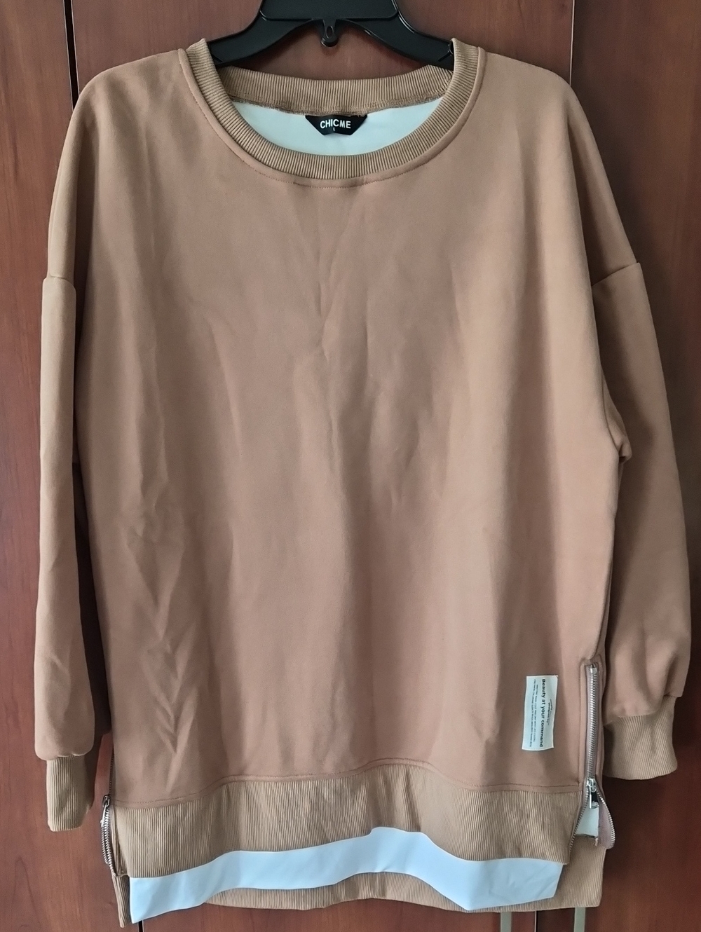 chic Tan Crewneck Sweatshirt with Layered Hem